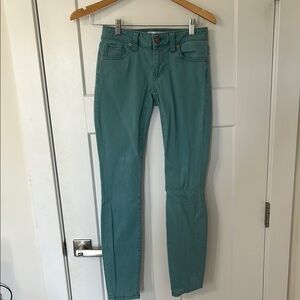 CAbi Green Skinny Pants Sleek and Versatile